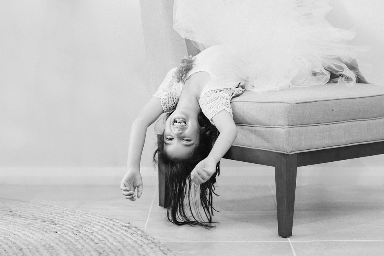 Flower girl having fun at a wedding
