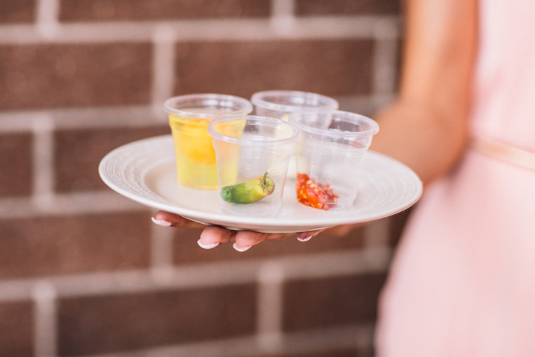 Groomsmen have to earn their way into the bride's house!