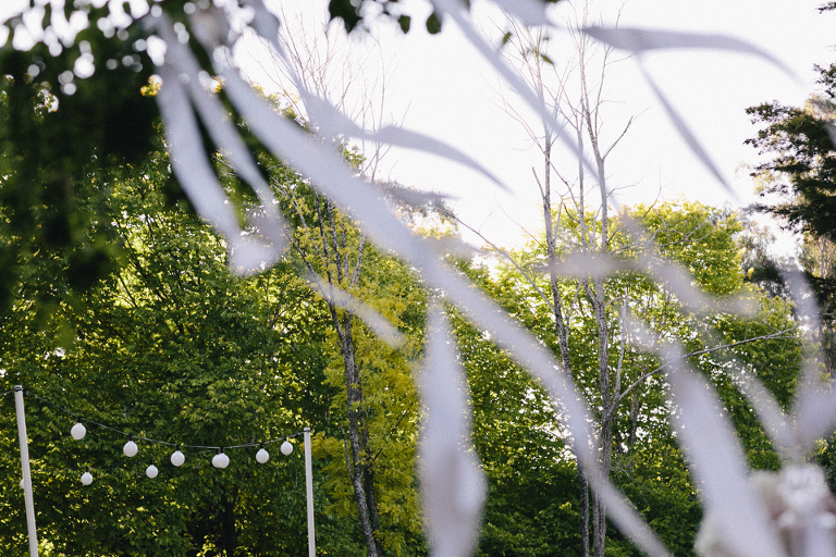 White ribbons streamers over wedding venue