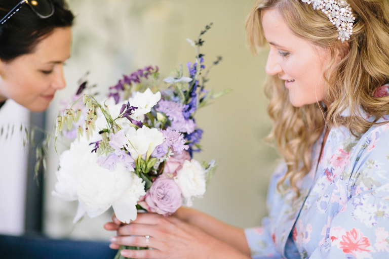 Bride receiving flowers