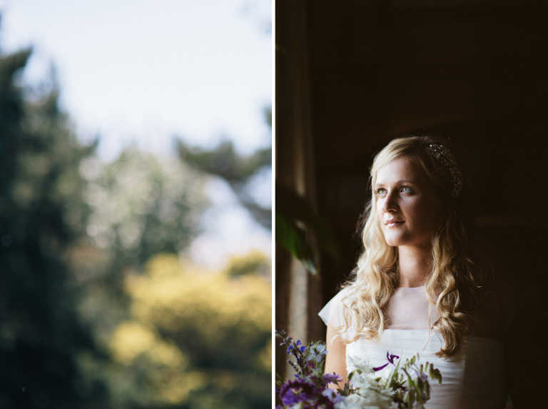 Bride in window with contrasted lighting