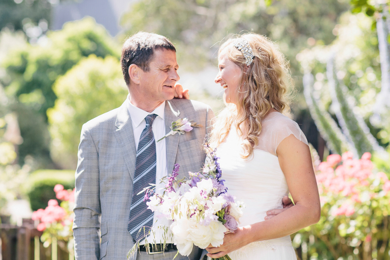 Bride with father before ceremony