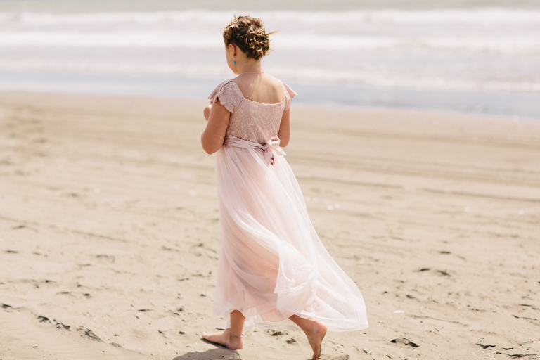 flower girl barefoot Te Horo Beach wedding natural light