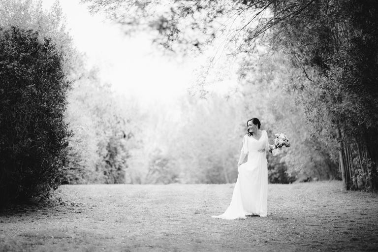 bride in forest holding bouquet Burnside Church Martinborough Wedding natural light black and white