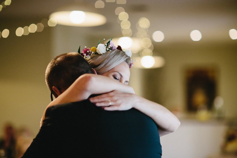 Bride hugging father during reception Martinborough Brackenridge Estate wedding natural light 