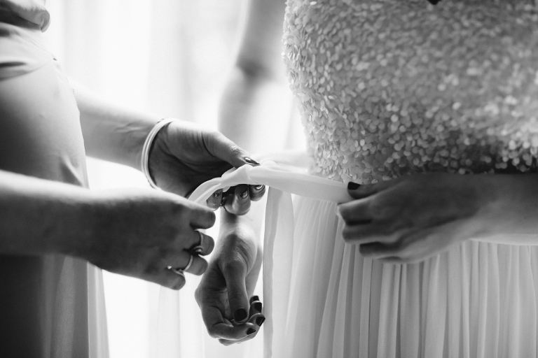 bride dressing close up of gown Martinborough Brackenridge Estate wedding black and white natural light 