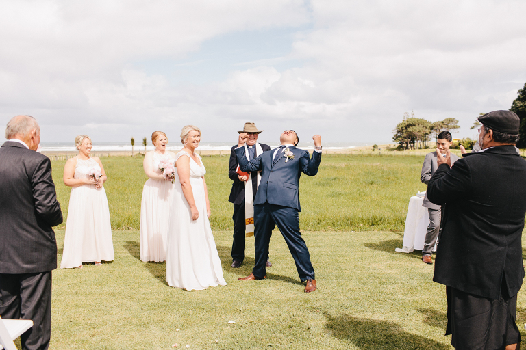 groom celebrating during ceremony Riversdale Wedding natural light