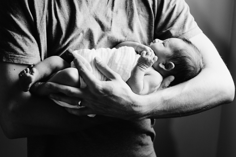 dad holding baby girl closeup Newborn Photography Wellington black and white
