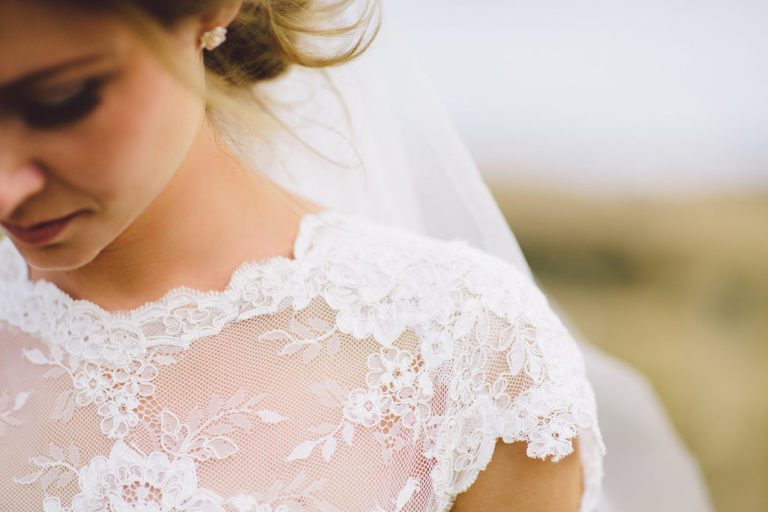close up of lace bridal gown Wellington wedding natural light